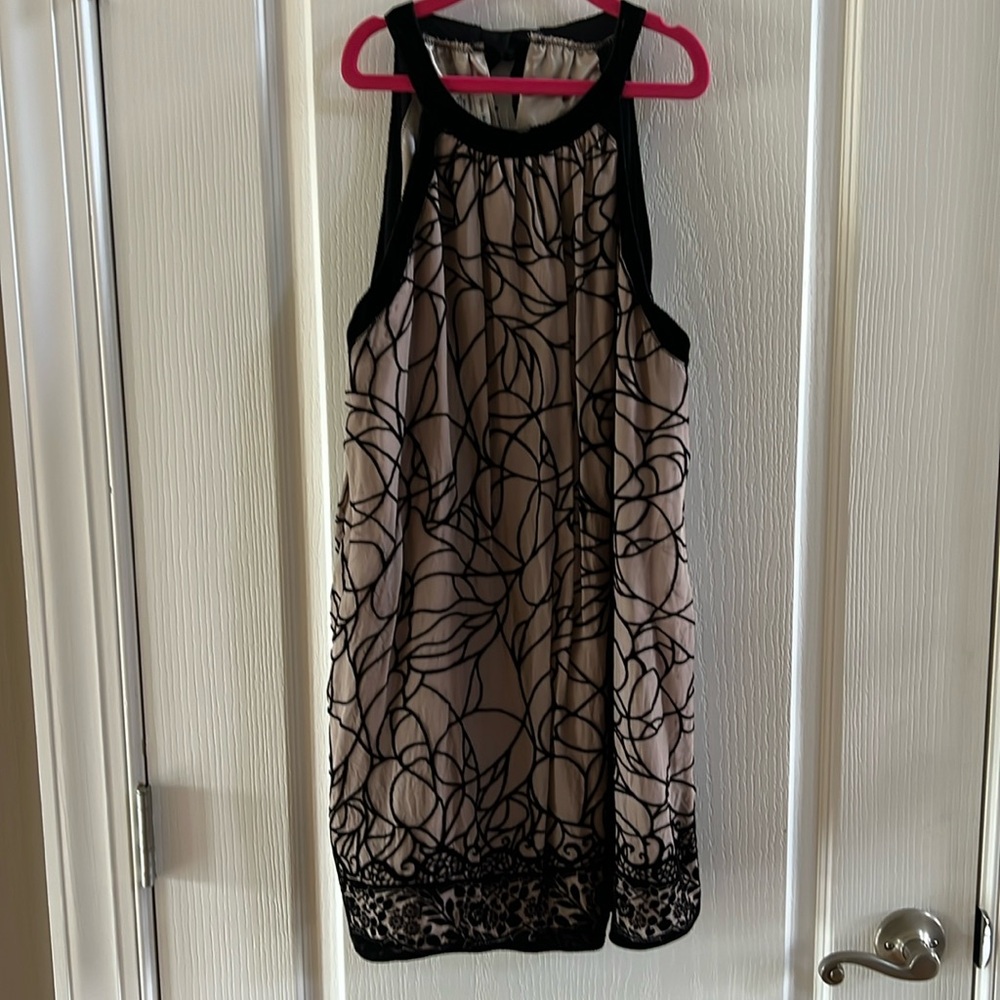 Sophie Max tunic, Rayon-silk shell over polyester- spandex layer.